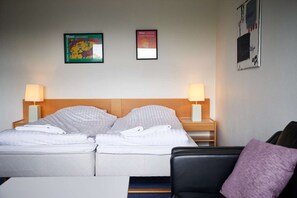 Family Room | Hypo-allergenic bedding, desk, blackout drapes, soundproofing