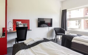 Hypo-allergenic bedding, desk, blackout drapes, soundproofing