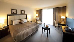 Minibar, desk, laptop workspace, iron/ironing board