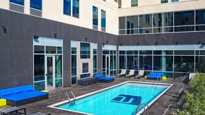 Seasonal outdoor pool, open 7 AM to 11 PM, pool umbrellas, sun loungers
