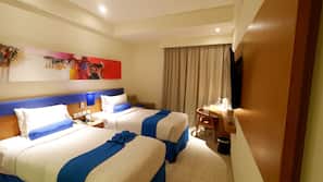 Premium bedding, down duvet, pillow top beds, minibar