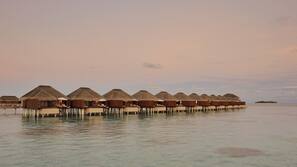 Private beach, white sand, beach towels, scuba diving