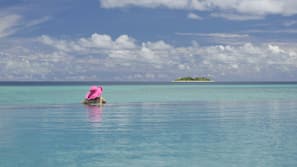 Outdoor pool, free cabanas, pool umbrellas
