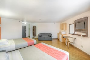 Deluxe Suite, 2 Queen Beds, Non Smoking, Refrigerator & Microwave | Desk, laptop workspace, free cribs/infant beds, rollaway beds