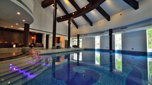 Indoor pool, seasonal outdoor pool, pool umbrellas, pool loungers