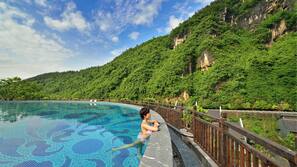 Indoor pool, seasonal outdoor pool, pool umbrellas, pool loungers