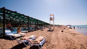 Plage privée, navette gratuite vers la plage, cabines gratuites
