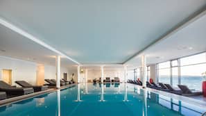 Indoor pool, open 7 AM to 10 PM, pool loungers
