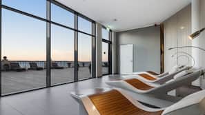 Indoor pool, open 7 AM to 10 PM, pool loungers