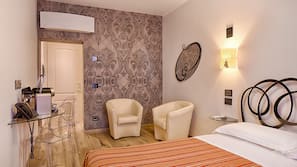 Premium bedding, down duvet, memory foam beds, free minibar