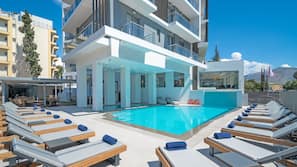 Seasonal outdoor pool, pool umbrellas, sun loungers