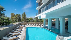 Seasonal outdoor pool, pool umbrellas, sun loungers