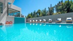 Seasonal outdoor pool, pool umbrellas, sun loungers