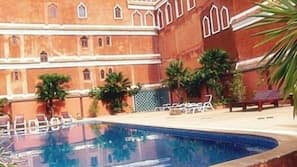 Outdoor pool, pool umbrellas, pool loungers