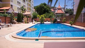 Outdoor pool, pool umbrellas, pool loungers