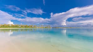 On the beach, sun loungers, scuba diving, snorkeling