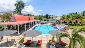 Outdoor pool, pool umbrellas, pool loungers
