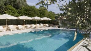 Outdoor pool, pool umbrellas, pool loungers