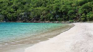 Beach nearby, white sand, sun loungers, beach umbrellas