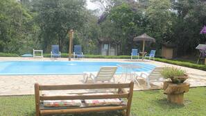 Outdoor pool, pool umbrellas, sun loungers