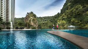 Outdoor pool, open 7:00 AM to 10:00 PM, pool loungers