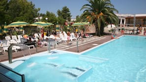 Seasonal outdoor pool, pool loungers