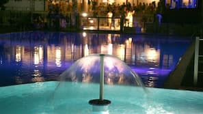 Seasonal outdoor pool, pool loungers