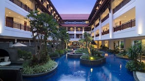 4 outdoor pools, open 8:00 AM to 9:00 PM, pool umbrellas, sun loungers