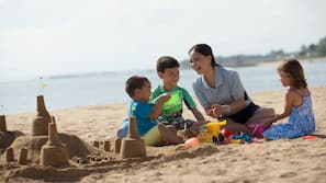 On the beach, sun loungers, beach umbrellas, beach towels