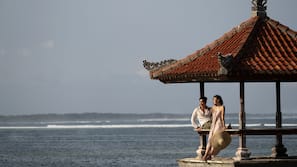 On the beach, sun loungers, beach umbrellas, beach towels