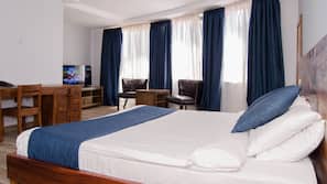 Ropa de cama de alta calidad, minibar, caja fuerte