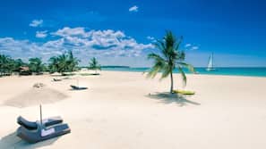 Beach nearby, beach umbrellas, beach towels, waterskiing