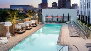 Outdoor pool, free pool cabanas, pool umbrellas