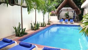 Outdoor pool, open 9:00 AM to 8:00 PM, pool loungers
