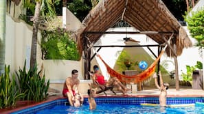 Outdoor pool, open 9:00 AM to 8:00 PM, pool loungers