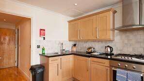 Fridge, microwave, oven, cookware/dishes/utensils