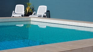 Outdoor pool, pool loungers
