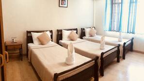 Desk, iron/ironing board, linens