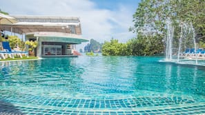 Outdoor pool, pool umbrellas, pool loungers
