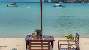 On the beach, beach towels, 2 beach bars