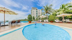 Outdoor pool, pool umbrellas, sun loungers