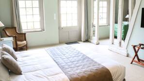 Hypo-allergenic bedding, desk, iron/ironing board, free cots/infant beds