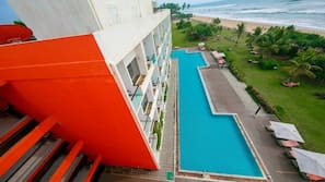 Outdoor pool, pool umbrellas, sun loungers