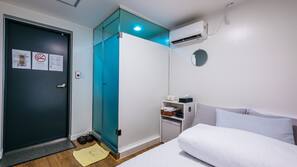 Blackout curtains, iron/ironing board, free WiFi, linens