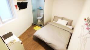 Blackout curtains, iron/ironing board, free WiFi, linens