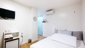 Blackout curtains, iron/ironing board, free WiFi, linens