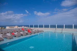 2 outdoor pools, pool umbrellas, sun loungers