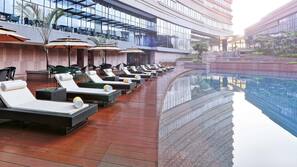 Outdoor pool, pool umbrellas, pool loungers