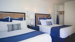 Premium bedding, down comforters, blackout drapes, iron/ironing board