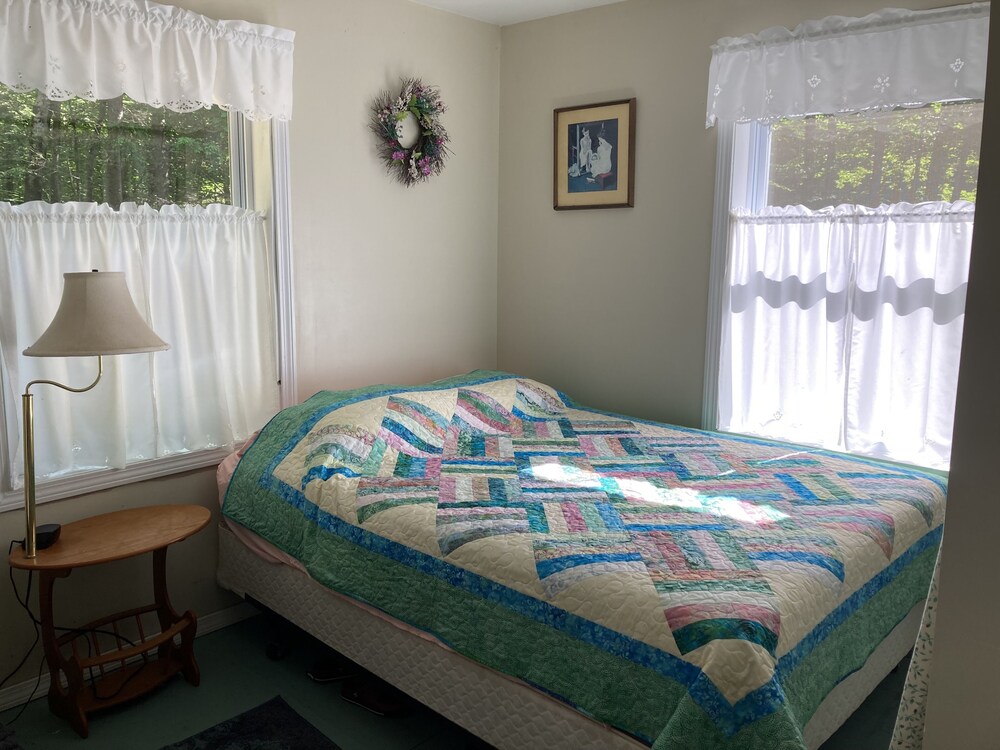 3Bd, 1 bath camp on Frye Island close to Beach 6 with screenedin porch